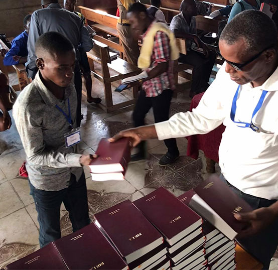 Giving a Bible to Pastors